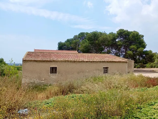 Terreno agrario con casa tipo albergue