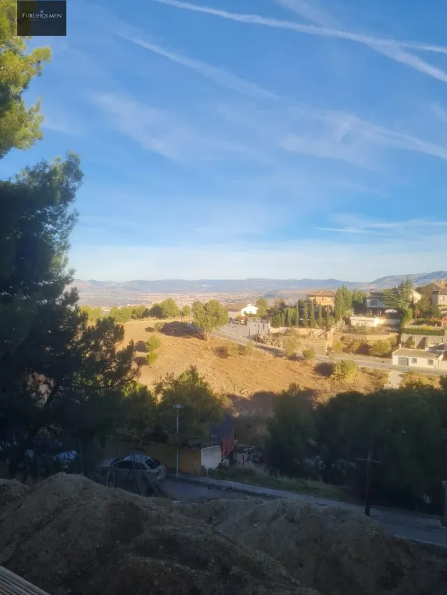 Parcela con una casita de madera en Cumbres Verdes. — 23