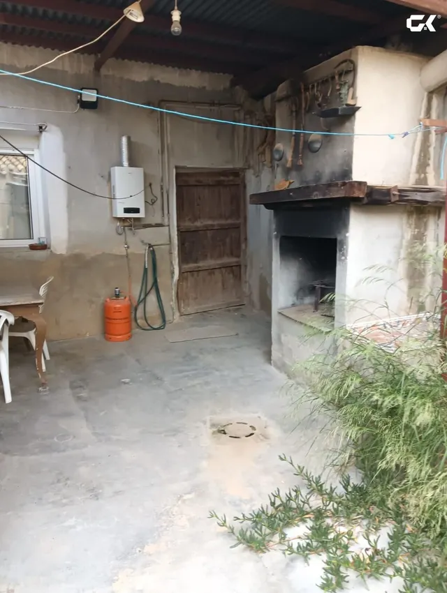 Casa de pueblo en Zarcilla de Ramos: cinco dormitorios, estufa de leña y un patio para vivir fuera — 11