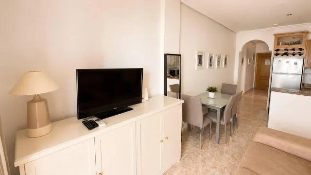 Apartamento turístico en primera línea de mar con piscina, garaje y solárium panorámico — 13