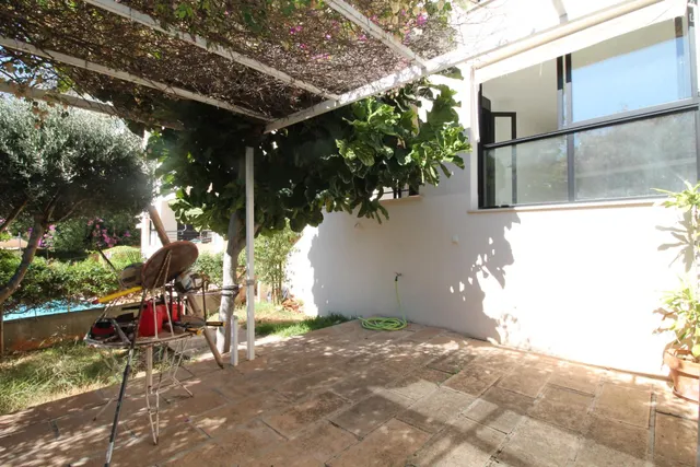 PLANTA BAJA CON JARDIN , GARAJES, TRASTERO Y PISICINA COMUNITARIA JUNTO A MARIVENT — 20