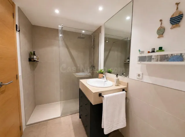 Planta baja con terraza y piscina comunitaria, en CAMPOS — 11