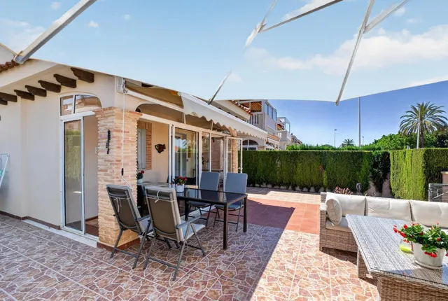 Residencial Zeniamar VIII – Acogedor adosado en esquina con solárium, piscina comunitaria, garaje y trastero — 29