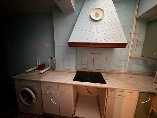 CASA EN EL CENTRO CON MUCHAS POSIBILIDADES — 12