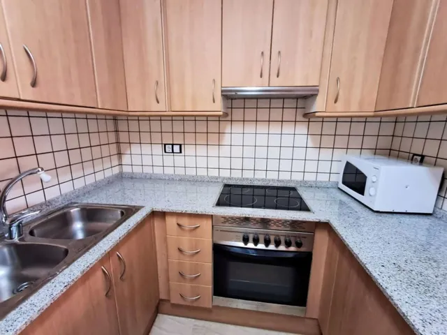Piso en Venta 2 Dormitorios con garaje Incluido — 12
