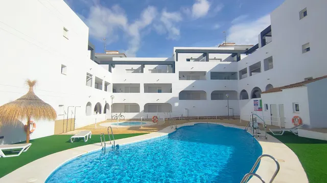 Apartamento de 1 dormitorio con terraza y piscina en Urbanización Milenio III en San Juan de los Terreros — 29
