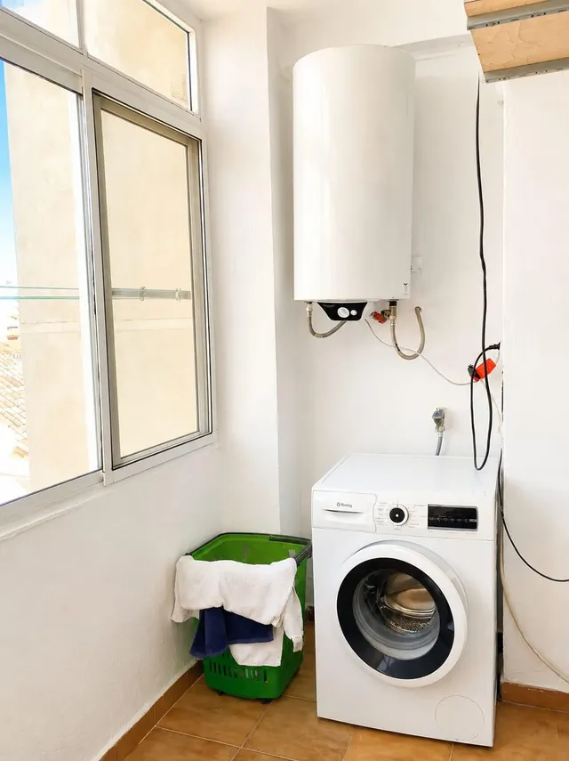 AMPLIO PISO DE TRES DORMITORIOS EN EL CENTRO DE FUENGIROLA — 11