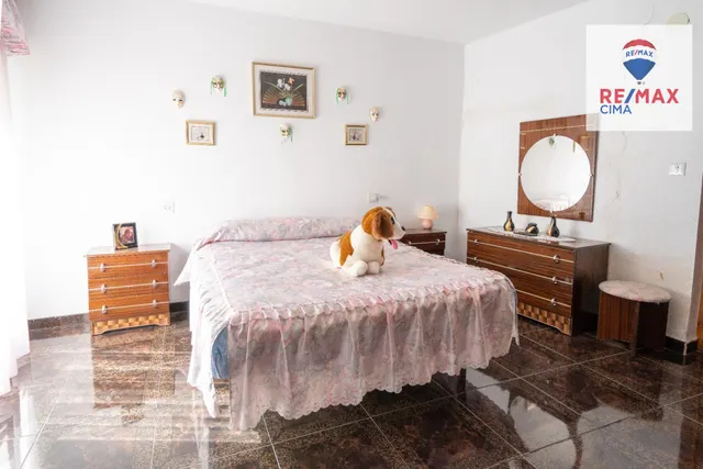 DOS CASAS MAS PARCELA DE 900  METROS — 31