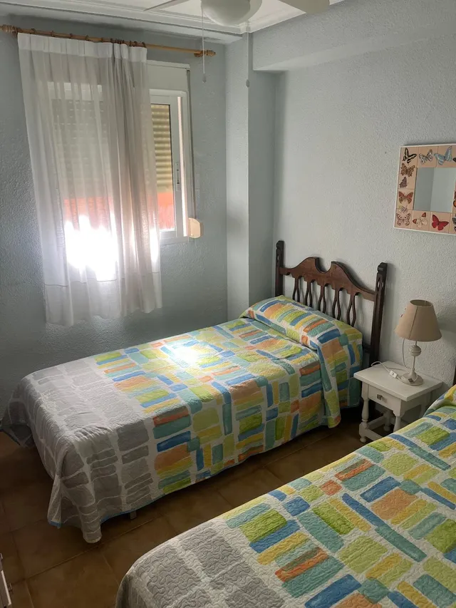 APARTAMENTO EN PRIMERA LÍNEA DE PLAYA EN BENIDORM CON TERRAZA Y PARKING — 12