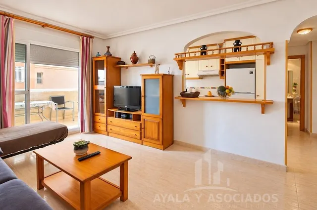 Apartamento en venta con terraza, piscina comunitaria y plaza de garaje, en la manga del mar menor, zona del estacio — 11