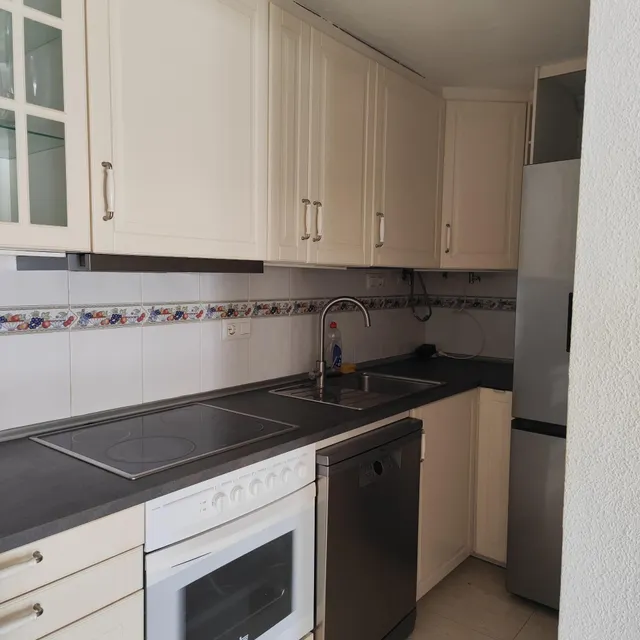 Adosado en Gran Alacant con solárium, balcón y piscina comunitaria — 11