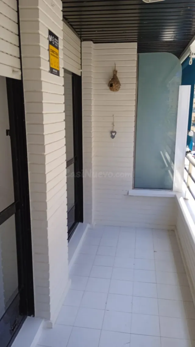 Apartamento de 1 dormitorio con vistas laterales al mar — 2