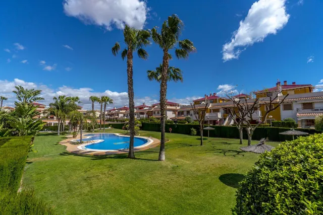 Residencial Zeniamar VIII – Acogedor adosado en esquina con solárium, piscina comunitaria, garaje y trastero — 45