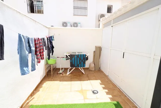 Torre de la Horadada adosado duplex frente a la piscina — 14