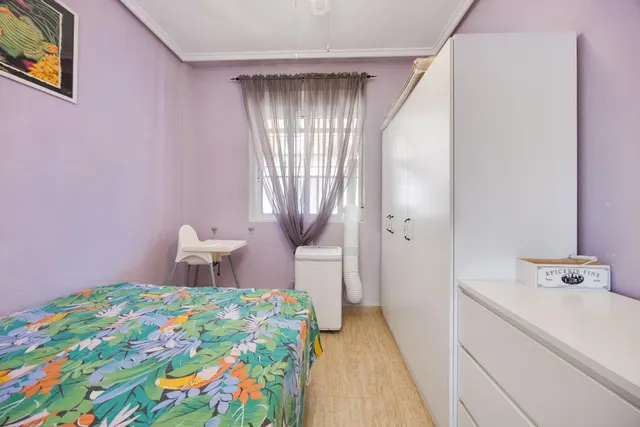 Bungalow de dos dormitorios y piscina comunitaria en Orihuela Costa — 16