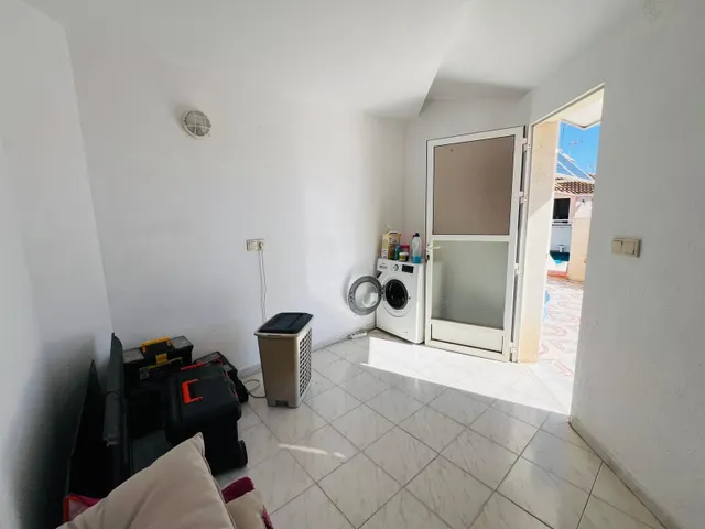 Encantador adosado con terraza y piscina comunitaria — 12