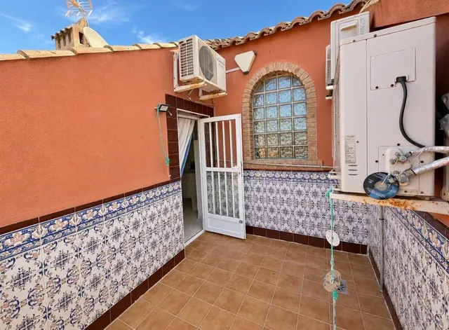 CHALET ADOSADO EN TORRE DE HORADADA — 38