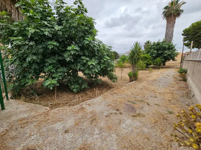 VIVIENDA CON TERRENO — 3