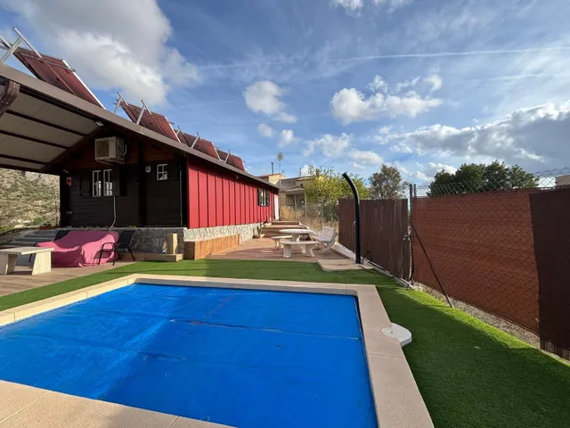 Se vende coqueta casa de madera con terreno en el rellano de molina — 12