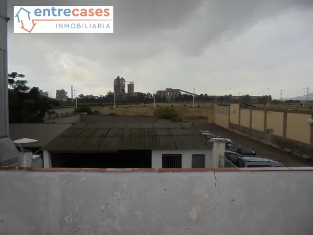 VENTA SOLAR INDUSTRIAL ZONA BALADRE PUERTO DE SAGUNTO CON VIVIENDA Y BAR — 29