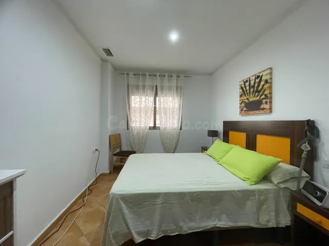 Apartamento reformado de 2 dormitorios con piscina comunitaria — 10