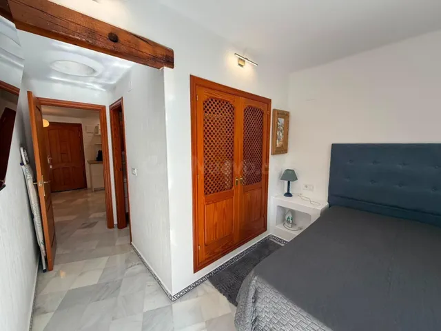 Maravilloso apartamento (aprox. 94 m2 - 1ª planta) en la popular Aldea del Mar con gran zona de piscina. Amplio balcón al sureste y a solo 400 m de la Playa de los Locos. — 23