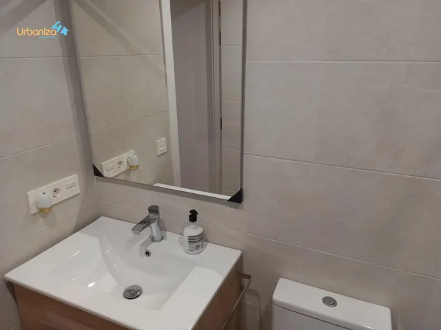 Se vende local adaptado como apartamento en semisotano de 1 dormitorio a estrenar, totalmente amueblado, sin pisiblidad de cambio de uso. — 12