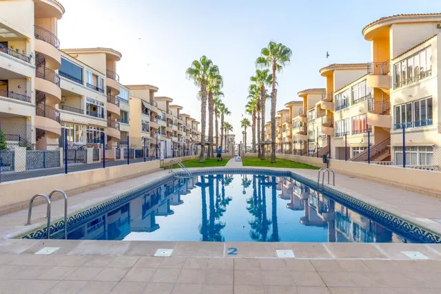 Villas Don Sancho V – Coqueto apartamento en planta baja con jardín, terrazas y piscina comunitaria. 2 dormitorios — 5