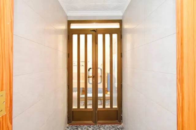VIVIENDA DE PLANTA BAJA CON SOLARIUM Y COCHERA — 26