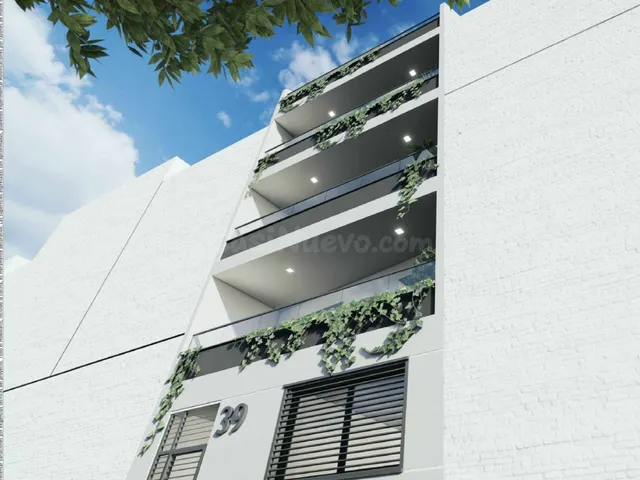 Edificio en construcción con ascensor, terraza y cerca del m