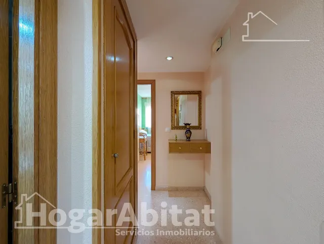 EXTERIOR CON DOS BALCONES Y GARAJE — 34