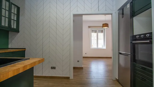 Casa en planta baja con entrada independiente, totalmente reformada, y local en planta baja. — 5