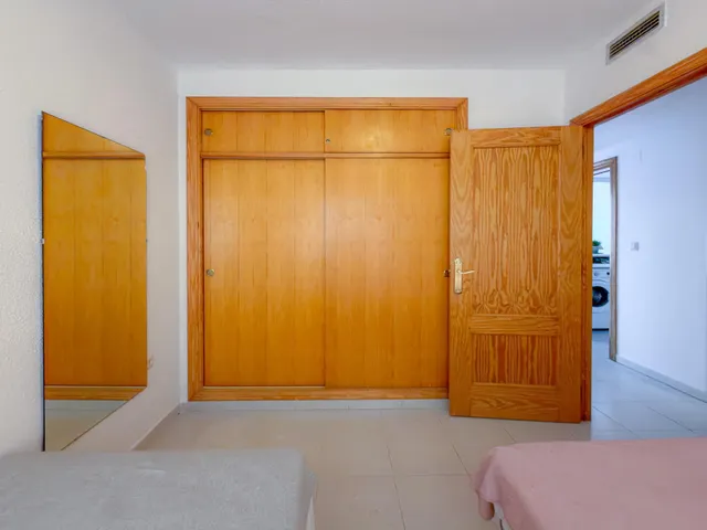 Amplio apartamento con 3 dormitorios y gran terraza con vistas a la piscina + Garaje incluido en el precio — 19
