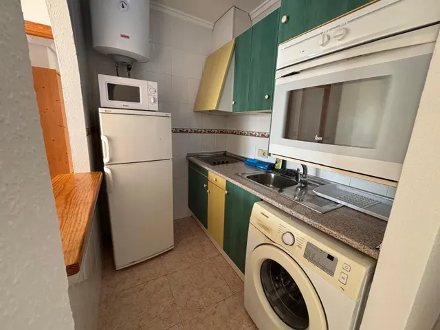 Ático de 2 dormitorios y 2 baños con piscina y parking a 550 metros del mar — 14