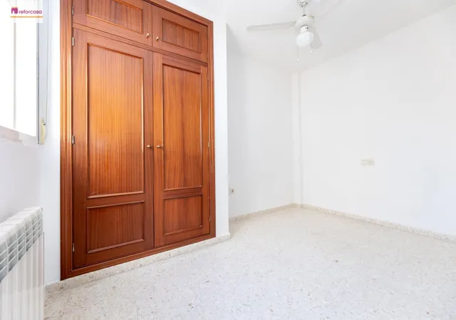 Vive en el corazón de Armilla: 4 dormitorios, patio, terraza y garaje — 16