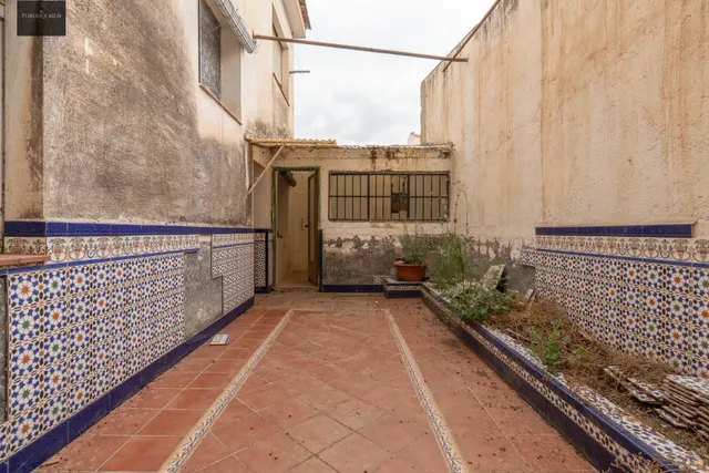 SE VENDE CASA CON UNA PARCELA DE 518 m2 (EN EL CENTRO DE LOS OGÍJARES). — 19