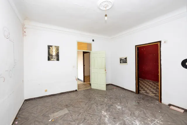 CONJUNTO DE PISOS Y PLANTA BAJA EN GRANADA CON 490 m2 — 23