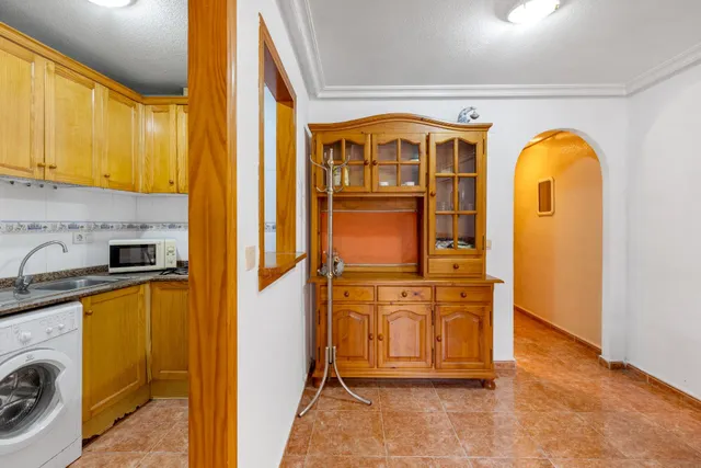 Acogedor piso en planta baja con piscina comunitaria — 12