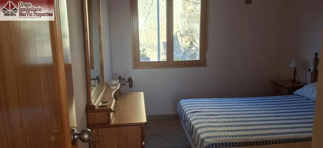 CASA DE DOS PLANTAS EN SELLA CON BUARDILLA — 12