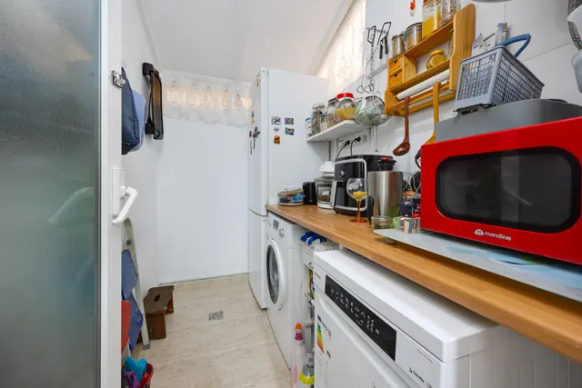 Bungalow de 2 dormitorios y piscina comunitaria en Orihuela Costa — 22