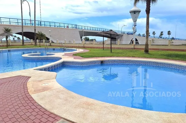 Apartamento en venta con terraza, piscina comunitaria y plaza de garaje, en la manga del mar menor, zona del estacio — 24