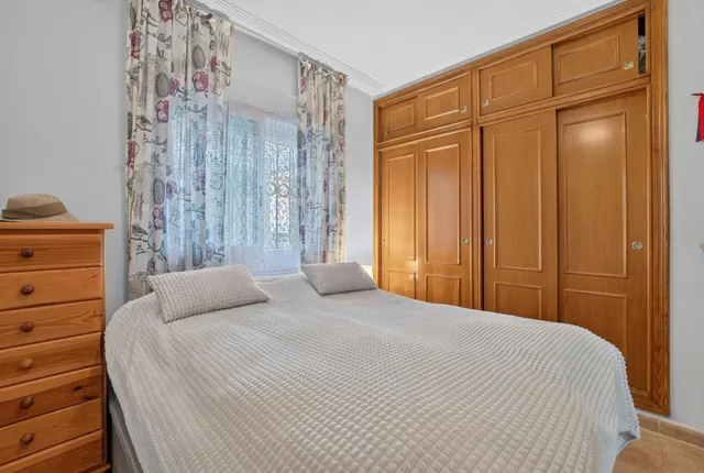 Villas Don Sancho V – Coqueto apartamento en planta baja con jardín, terrazas y piscina comunitaria. 2 dormitorios — 16
