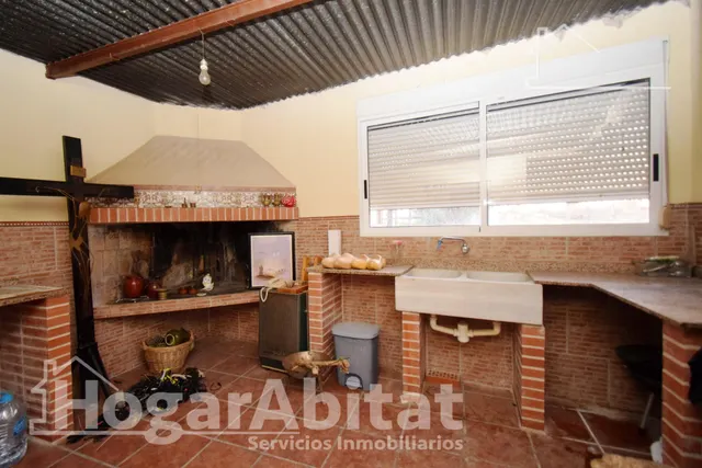 OPORTUNIDAD DE PROPIEDAD RUSTICA CON TERRENO Y PISCINA — 23