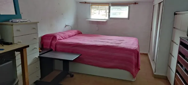 PARCELA CON TRES APARTAMENTOS — 21