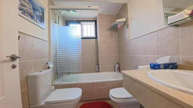Apartamento de planta baja de esquina con 2 dormitorios con jardin y vistas parciales al mar — 22