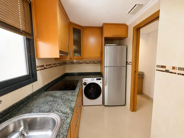 Ático dúplex con vistas frontales al mar y amplio solárium en Guardamar del Segura — 15