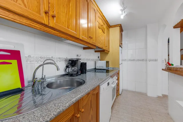 Apartamento dúplex con piscina comunitaria, Alicante, Orihuela Costa. 2 habitaciones, 89 m2, 1,6 kilómetros del mar — 13