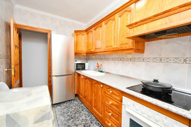 VIVIENDA DE PLANTA BAJA CON SOLARIUM Y COCHERA — 9