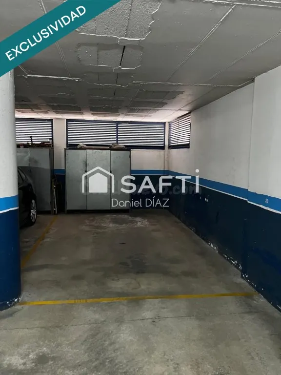 Plaza de parking con almacenamiento.