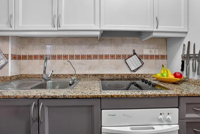 Villas Don Sancho V – Coqueto apartamento en planta baja con jardín, terrazas y piscina comunitaria. 2 dormitorios — 12